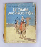 BD : Les aventures de TINTIN par Hergé chez Casterman : - Le Crabe aux Pinces d'Or - A23 bis 1944 (1945) DJ gardes bleues foncé (déchirures , écritures , usures)