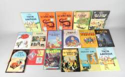 BD : Hergé : Env 27pces sur l'univers Tintin (certains en parfait état , d'autres usure importante) dont : Vie sexuelle de Tintin sous blister , BD , album film , figurines , album