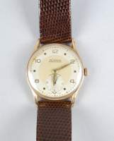 Bijou : Montre bracelet d'homme DELBANA en or jaune 18K (En état) mouvement à remontoir