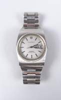 Bijou : Montre bracelet d'homme OMEGA Constellation Mega - quartz 32 KHz en acier (en état , trace d'usage) fond vissé