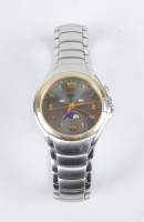 Bijou : Montre bracelet RODANIA mvt à quartz (En état) avec phases de lune , dateurs quantième , jours et mois en acier 2 tons (usure)