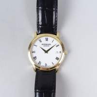 Bijou : Montre bracelet d'homme RAYMOND WEIL GENEVE en plaqué or mvt à quartz (En état) avec guichet dateur