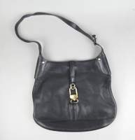 Mode : Sac à main en cuir DELVAUX modèle YUCCA (bel état gen , légère usure d'usage)