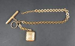 Bijou : Chaine de montre de gousset avec porte photo et clé le tout en or jaune 18K (attache en argent)