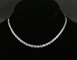 Bijou : Bracelet rivière en chute transformé en collier en platine serti de diamants