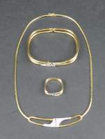 Bijou : Parure (collier , bracelet , bague) en or jaune et blanc 18K sertie de diamants