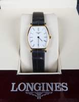Bijou : Montre bracelet d'homme LONGINES la grande classique forme tonneau en plaqué or mvt à quartz (En état)
