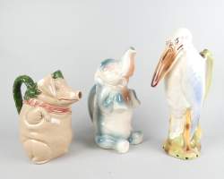 Ceramique : pichet en faience (3) : Saint Clément(2) : Eléphant et Marabout (cigogne) + Orchies - Cochon au jambon - (egr)