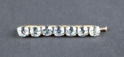 Bijou : Broche barrette en or jaune 18K sertie de topazes bleues