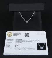 Bijou : Collier et pendentif en or blanc 18K serti d'un diamant solitaire avec certificat IGI