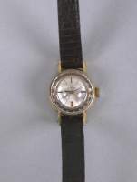 Bijou : Montre bracelet de dame OMEGA métal doré ciselé mvt à remontoir (En état) fond acier bracelet usures
