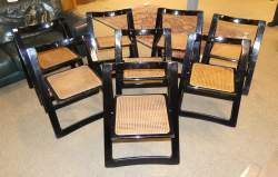 Meuble : 8 chaises pliantes modèle - Trieste - en hêtre laqué et assise cannées (usure d'usage , acc) designer JACOBER Aldo