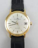 Bijou : Montre bracelet d'homme BAUME & MERCIER Genève en or jaune 18K mvt à remontoir (s'arrête , cuvette arrière abimée)
