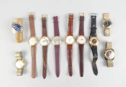 Bijou : Montre bracelet d'homme métal doré mvt à remontoir (10) (En état) (usures)