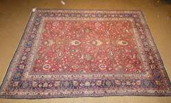 Tapis d'Orient noué main MASHAD (usures)