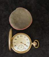 Bijou: Montre chronomètre de gousset YUNGHANS en métal doré remontoir dans houss