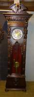 Meuble : Horloge de parquet de style Néo-renaissance en chêne sculpté (éléments anciens) mouvement type Wesminster à carillon