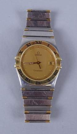 Bijou : Montre bracelet OMEGA Constellation en acier et or jaune mvt à quartz (En état , usures) avec dateur