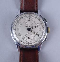 Bijou : montre bracelet d'homme chronographe BREITLING acier (usures) (en état)