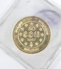 Collection : pièce de monnaie belge de 50 écus 1987 d'or Collection : pièce de monnaie belge de 50 écus 1987 d'or