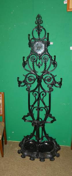 Meuble : Portemanteau en fonte (traces d'usage) avec miroir (ecl)