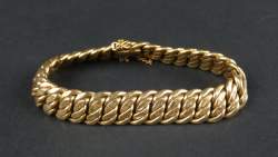 Bijou : Bracelet en or jaune 18K avec attache de sécurité Bijou : Bracelet en or jaune 18K avec attache de sécurité