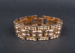 Bijou : Bracelet en or jaune 18K avec attache et chaine de sécurité Bijou : Bracelet en or jaune 18K avec attache et chaine de sécurité