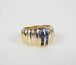 Bijou: Bague en or jaune 18K sertie de diamants pour env. 0,25cts et de saphirs