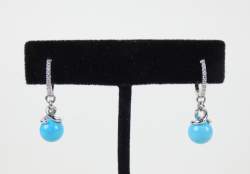 Bijou: Paire de boucles d'oreilles en or blanc 18K sertie dediamants pour env. 0