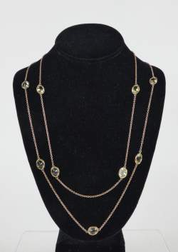 Bijou: Collier/sautoir en or jaune 9K serti de quartz/citrines P: 21,7g L: env.1