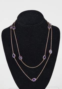 Bijou: Collier/sautoir en or jaune 9K serti de quartz/améthystes P: 18,2g L: env