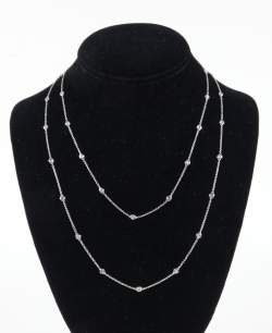 Bijou: Collier/sautoir en or blanc 14K serti de 33 diamants pour env. 1,70cts P: