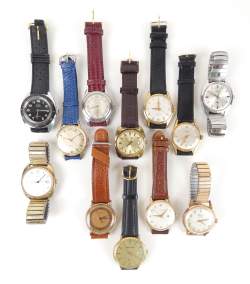 Bijou : Montre bracelet d'homme métal argenté / doré / acier mvt à remontoir (12) (En état , usures)