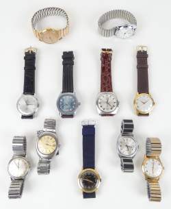 Bijou : Montre bracelet d'homme métal argenté / doré / acier mvt à remontoir (11) (En état , usures)